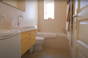 Shower, towels, toilet paper