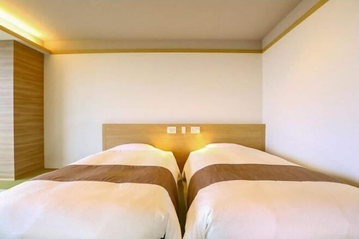 Een kluis op de kamer, verduisterende gordijnen, gratis wifi, beddengoed