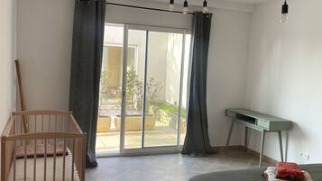 2 bedrooms, desk, iron/ironing board, travel crib