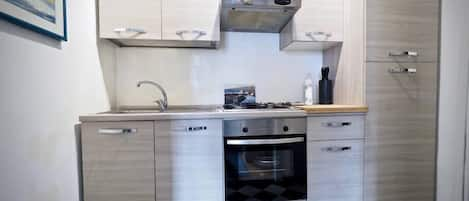 Refrigerador, horno, placa de cocina