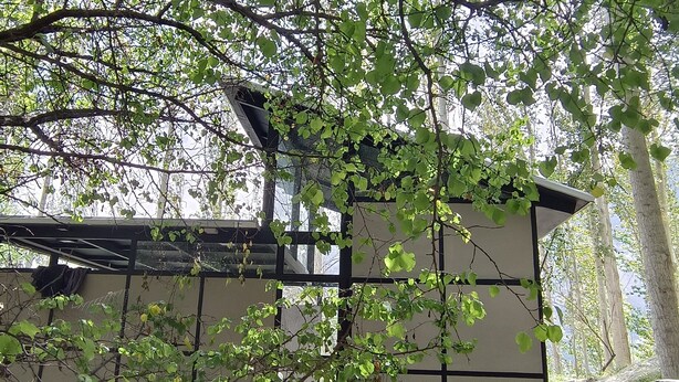 A traditional Japanese-style building with a tiled exterior and a stone base. - Zihin With Forest View - Cloud Nine And a Half (Karimabad)