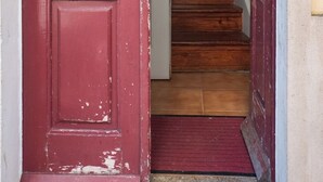 A red door with a metal decorative panel and a nameplate reading "Mr. Green." - Porto Gaia City House (Vila Nova de Gaia)