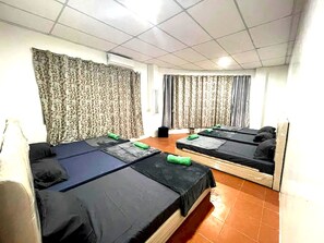 Family Room, Private Bathroom | Desk, laptop workspace, free WiFi, bed sheets - OYO HOME 90768 Flo Inn Motel (Tawau)