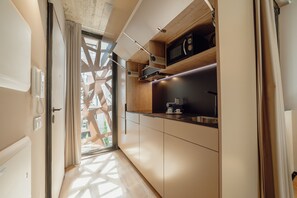 Fridge, microwave, coffee/tea maker, toaster