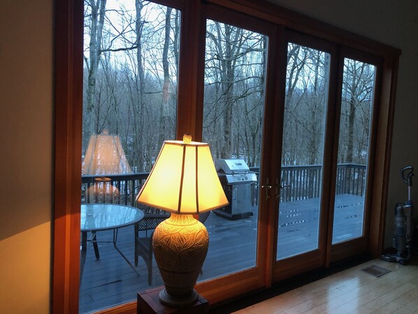 Enjoy al fresco dining on the deck with a grill and outdoor seating.