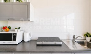 Fridge, microwave, stovetop, electric kettle