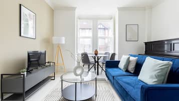 Apartment | Living area | 37-inch TV with cable channels, Netflix, streaming services