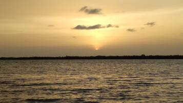 On the beach, white sand, free beach shuttle, 5 beach bars