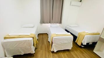 Quarto triplo standard | Roupa de cama