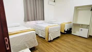 Quarto triplo standard | Roupa de cama