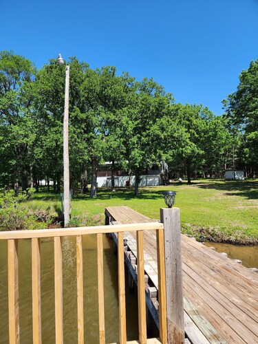 The home is lakefront, perfect! From the roadside, it's nearly impossible to see