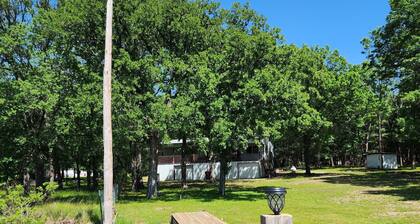The home is lakefront, perfect! From the roadside, it's nearly impossible to see