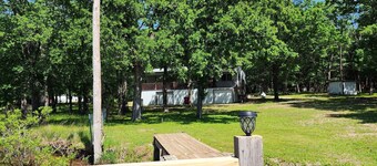 The home is lakefront, perfect! From the roadside, it's nearly impossible to see