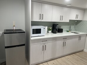 Fridge, microwave, coffee/tea maker, electric kettle