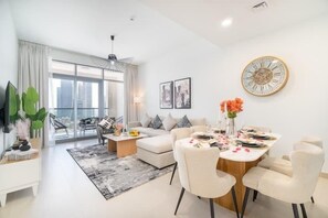 Luxury Apartment | Living area | 65-inch Smart TV with digital channels, TV, streaming services - Downtown - Bellevue Towers (Dubai)