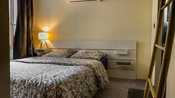 1 chambre, fer et planche Ă repasser, Wi-Fi gratuit, draps fournis