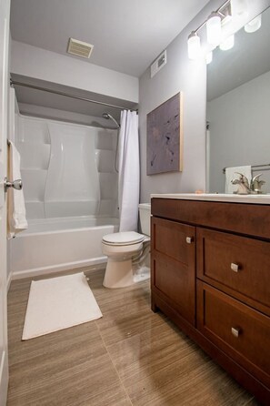 Bathtub, hair dryer, towels