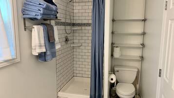 Shower, hair dryer, towels, soap