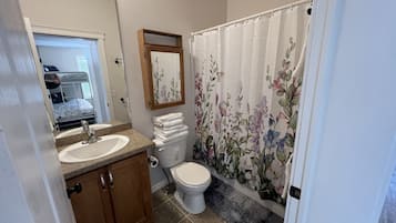 Hair dryer, towels, soap, shampoo