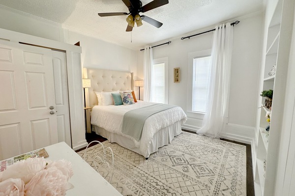 Queen bed and vanity desk
