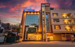 A modern hotel building with a sign for 'fabHOTELS' and 'Paliwal' on the facade. - FabHotel The Mall Inn (Kanpur)