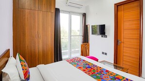 Egyptian cotton sheets, premium bedding, in-room safe, desk - FabHotel Sunrise Sector 56 (Noida)
