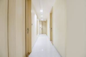 Stylish hallway with doors leading to various rooms.