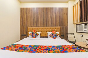 Deluxe Room | Egyptian cotton sheets, premium bedding, in-room safe, free WiFi - Fabexpress Jayati Oasis (Lucknow)