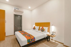 Habitación Deluxe | Sábanas de algodón egipcio, ropa de cama de alta calidad, caja fuerte