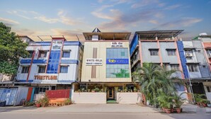 A hotel with multiple floors, a prominent sign for 'White Gold', and a 'FabHotels' logo. - FabHotel White Gold (Navi Mumbai)