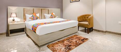 Deluxe Room | 1 bedroom, Egyptian cotton sheets, premium bedding, in-room safe