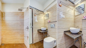 A modern bathroom with a shower, toilet, and sink. - Fabhotel Green Park Residency (Bengaluru)