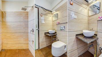 Deluxe Room | Bathroom | Shower, rainfall showerhead, free toiletries, towels