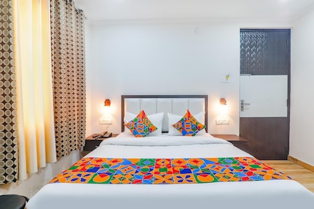 Deluxe Room | Egyptian cotton sheets, premium bedding, in-room safe, desk