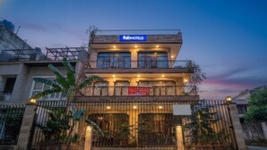A two-story building with a sign reading "fabHOTELS" at the top. - FabHotel Goodwill Homes (New Delhi)