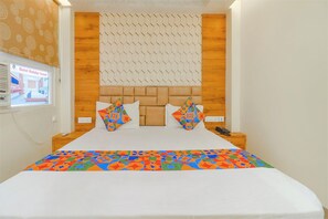 Premium Room | Egyptian cotton sheets, premium bedding, in-room safe, free WiFi - Fabhotel Holiday Grand (Danapur)
