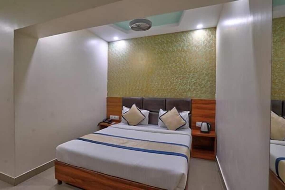 Habitación Deluxe | Sábanas de algodón egipcio, ropa de cama de alta calidad, wifi gratis