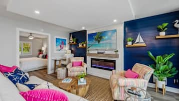 1 bedroom, desk, iron/ironing board, travel crib