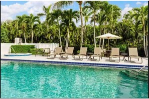 Outdoor pool, a heated pool - Stunning 2 BR Condo with Onsite Restaurants, Live Music, Shops , Sleeps 8 (Marco Island)