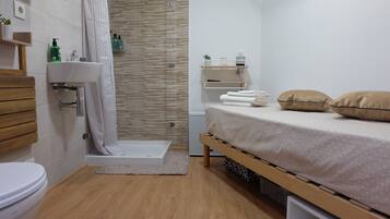 Shower, eco-friendly toiletries, hair dryer, towels