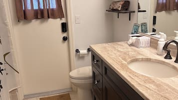 Hair dryer, towels, soap, toilet paper