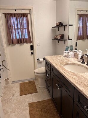 Hair dryer, towels, soap, toilet paper