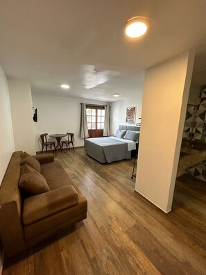 Standard Triple Room | Desk, laptop workspace, blackout curtains, iron/ironing board