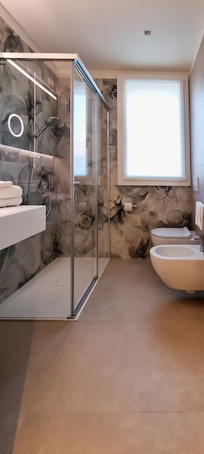 Hair dryer, towels, toilet paper