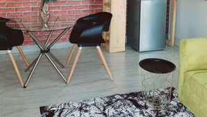 Suite studio exclusive, 1 grand lit | Bureau, espace de travail pour ordinateurs portables
