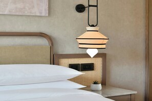 Roba de llit d'alta qualitat, minibar i caixa forta a l'habitació 