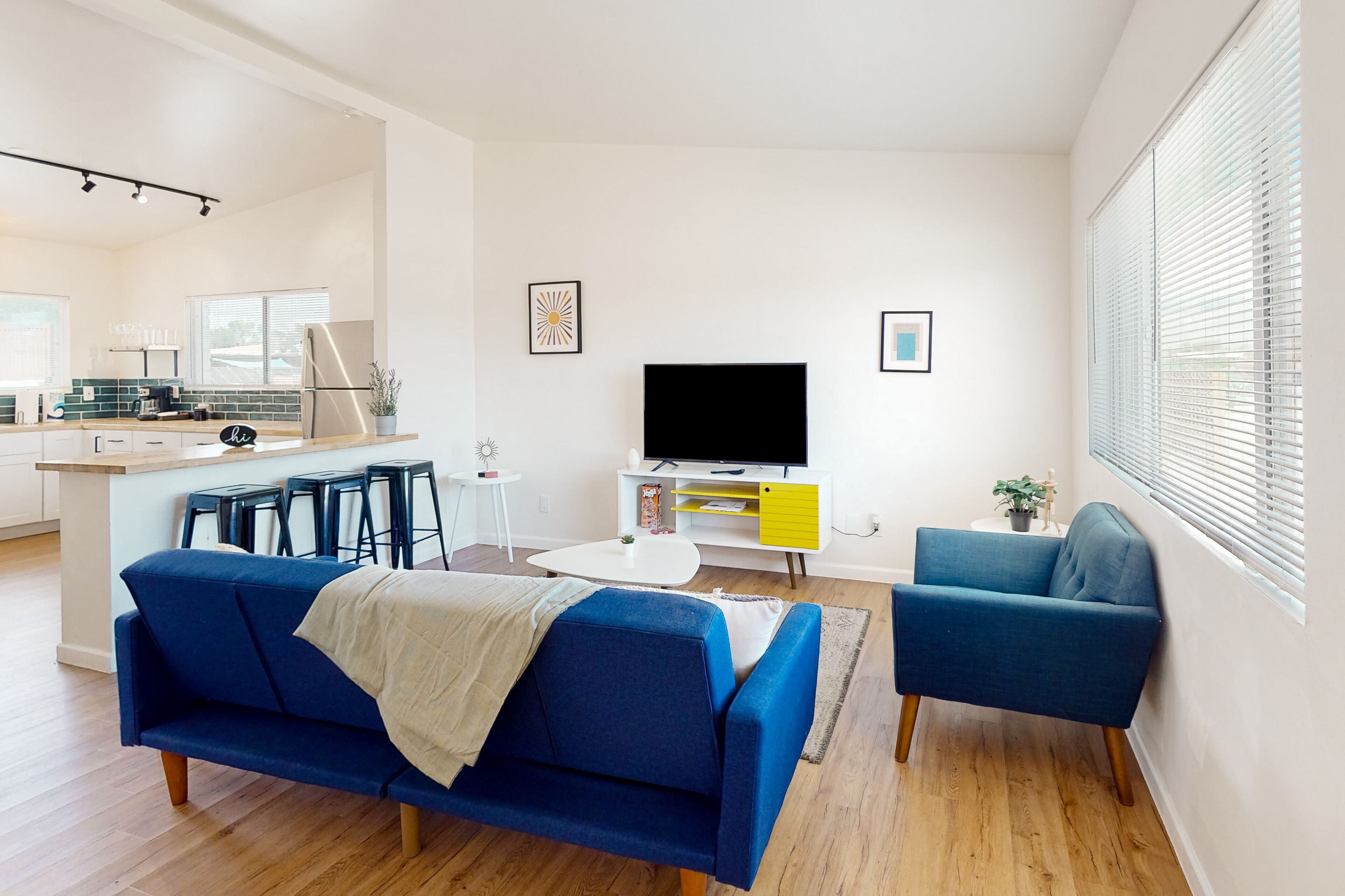 Inviting dog-friendly triplex with full kitchen, central AC, & W/D