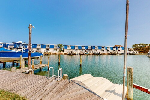 Waterfront townhome with a game room, boat slips, and grill - scenic views