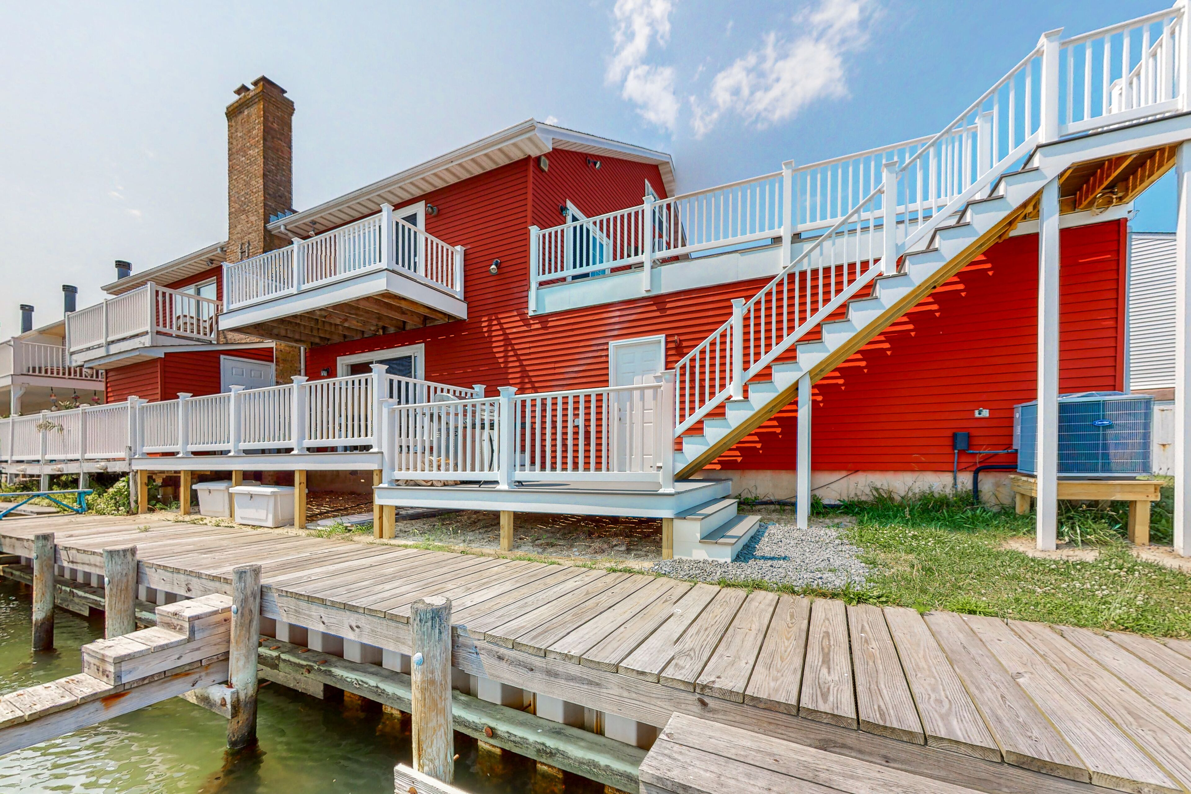 Waterfront townhome with a game room, boat slips, and grill - scenic views