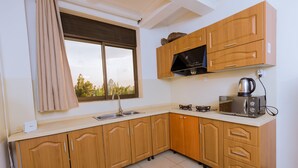 Unclassified image, 2 of 14, button - Kami Luxury Apartment (Kigali)